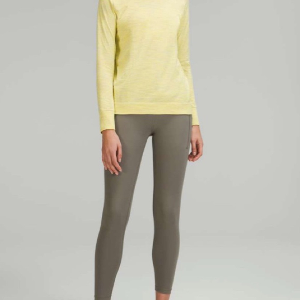 New with Tags Lululemon Power Thru HR Tight 25”. Size 14